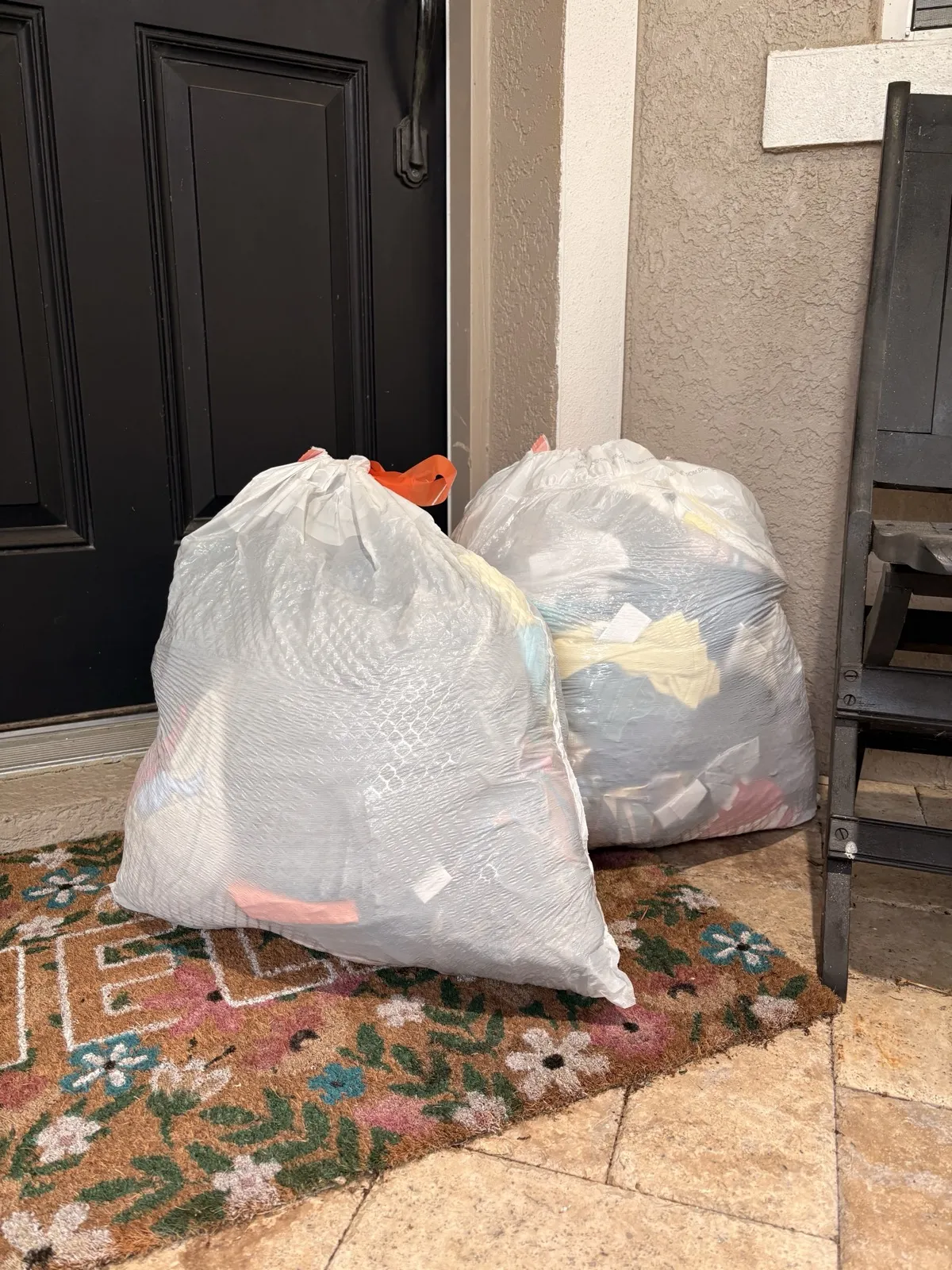 Bagged trash set out for 813 Junk Solutions doorstep valet trash pickup